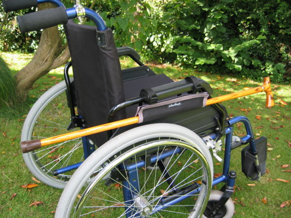 Soporte baston para sillas de ruedas